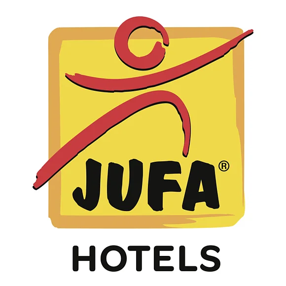 Das Logo der "JUFA Hotels" zeigt ein rotes Strichmännchen vor einem gelben Quadrat.